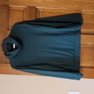 Green turtleneck pullover